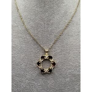 Gold tone wreath pendant necklace red glass stones rhinestone accents